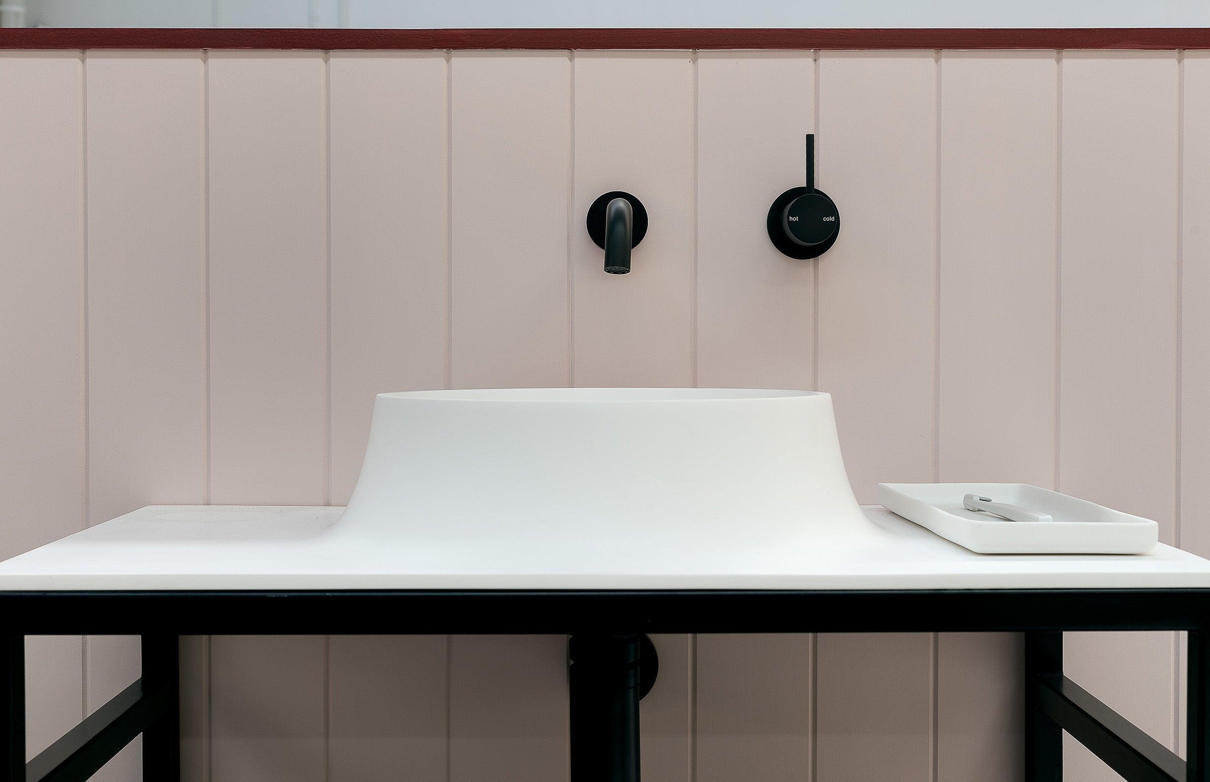 Phoenix Vivid Slimline Wall Bath O/Let Curved 180mm Matt Black - Burdens Plumbing